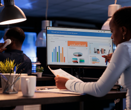 african-american-woman-analyzing-business-charts-computer-documents-looking-online-research-data-create-presentation-working-with-information-report-statistics-pc