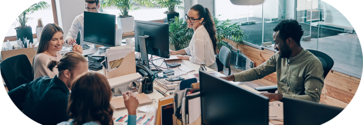 group-young-modern-people-smart-casual-wear-communicating-using-modern-technologies-while-working-office (1)