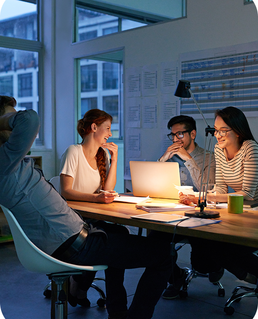 putting-work-cropped-shot-four-colleagues-working-into-night