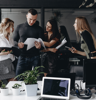young-team-works-with-documents-discuss-project-stylish-modern-office-work-process-office (1)
