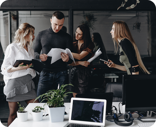 young-team-works-with-documents-discuss-project-stylish-modern-office-work-process-office (1)